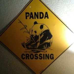 Metal panda crossing sign